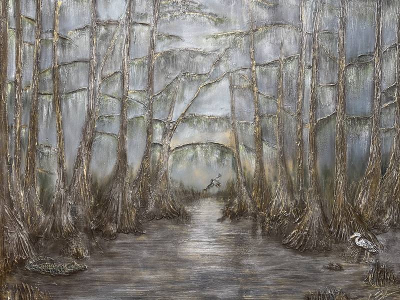 Landscape artwork depicting a tranquil waterway bordered by textured trees, with a crocodile and a heron visible in the scene.